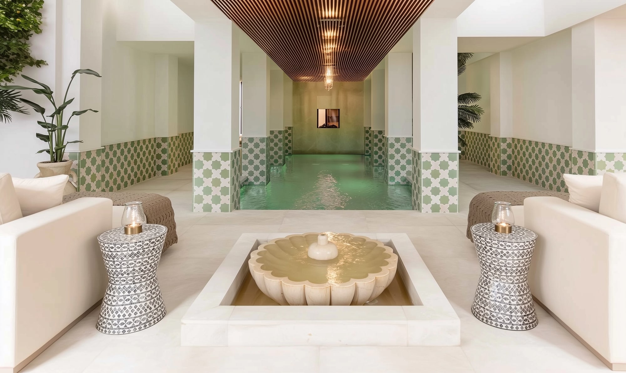 Indoor spa courtyard with water feature, green tile walls and crafted timber ceiling, Villa Africa in Marbella