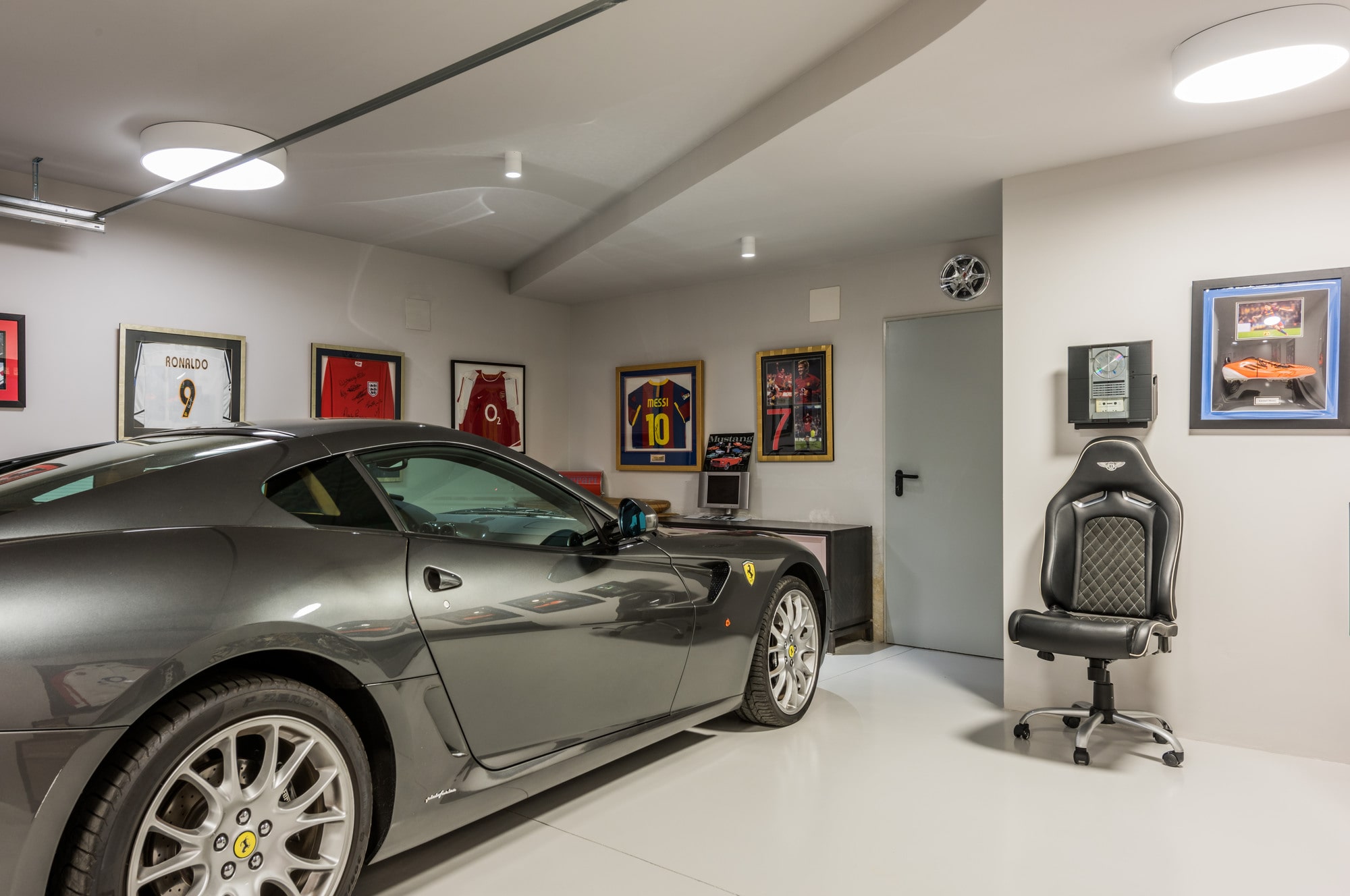 Private garage at Villa Australia designed as part of a high-end residential lifestyle experience