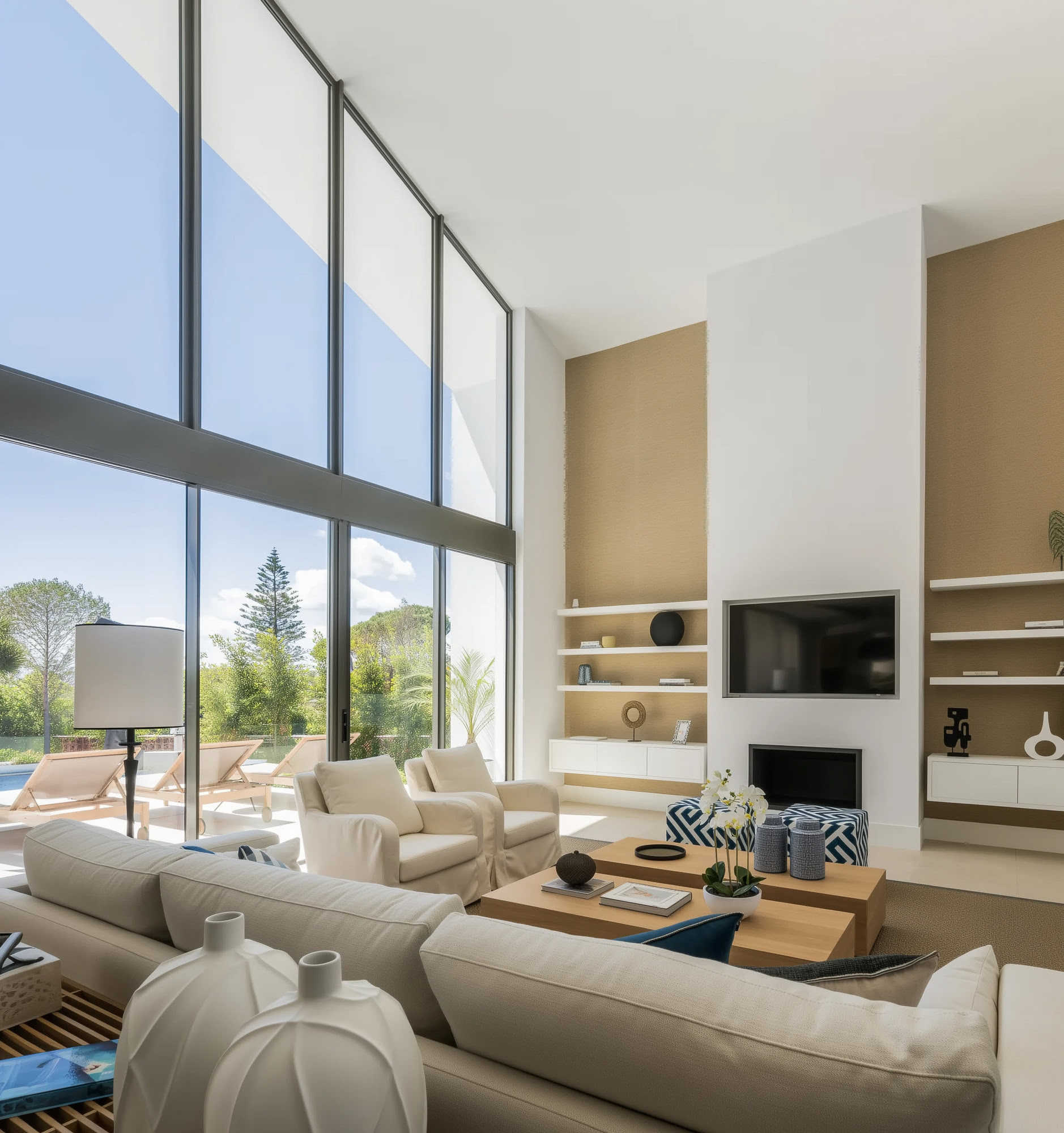 Living room with floor to ceiling glazing and views to the garden