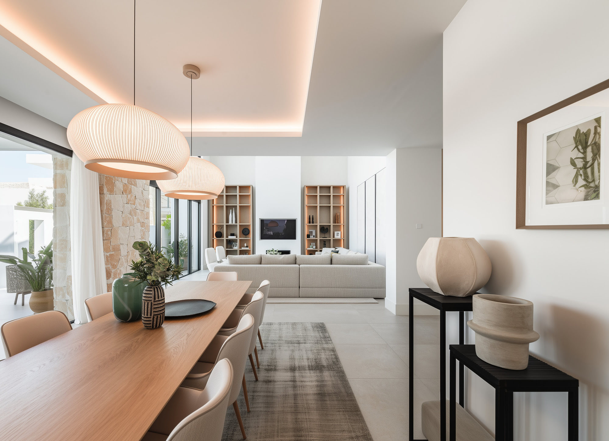 Interior corridor with warm finishes connecting the main spaces