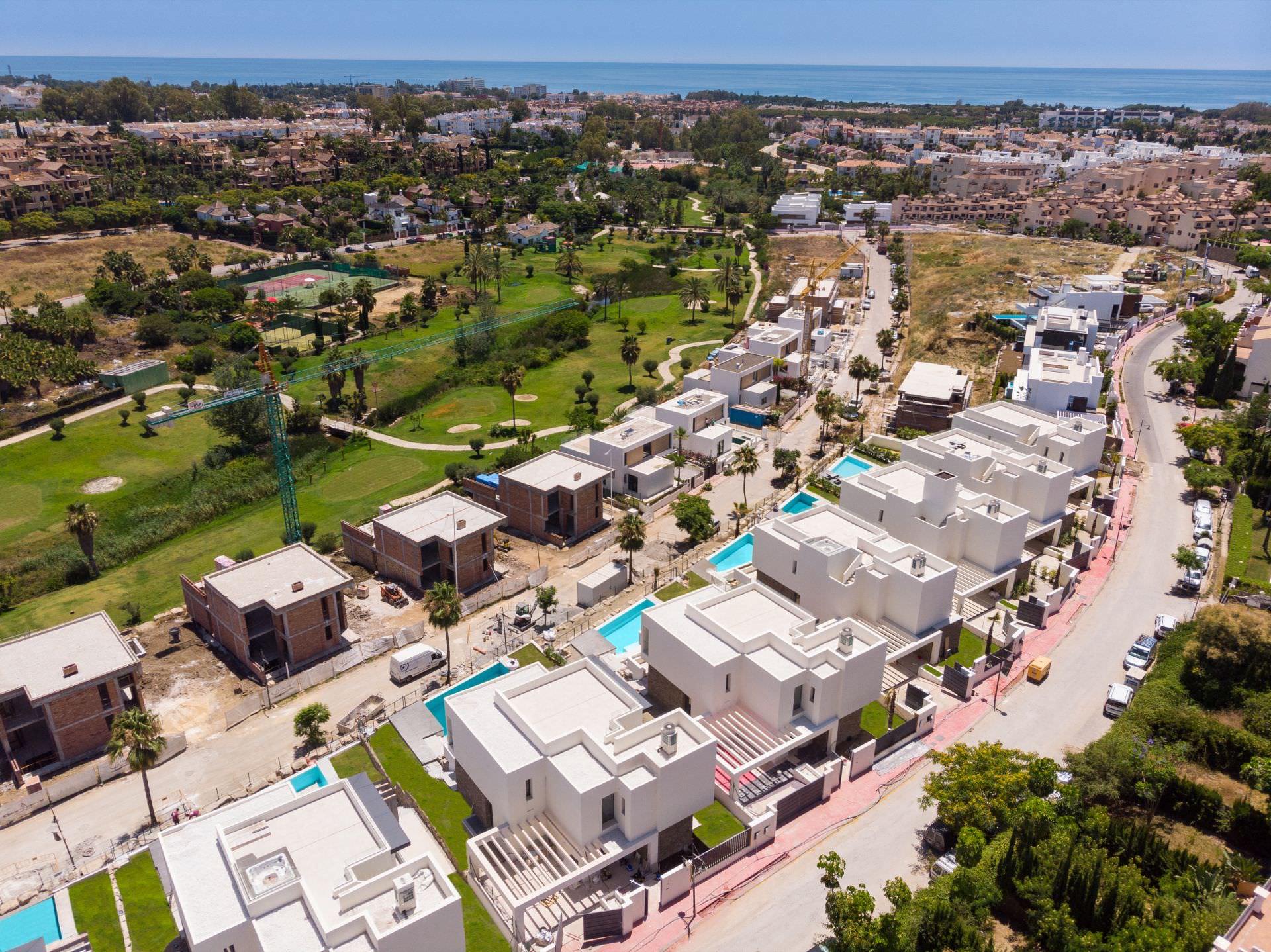 Aerial view of the BELFRY villa collection within its urban context in Estepona on the Costa del Sol