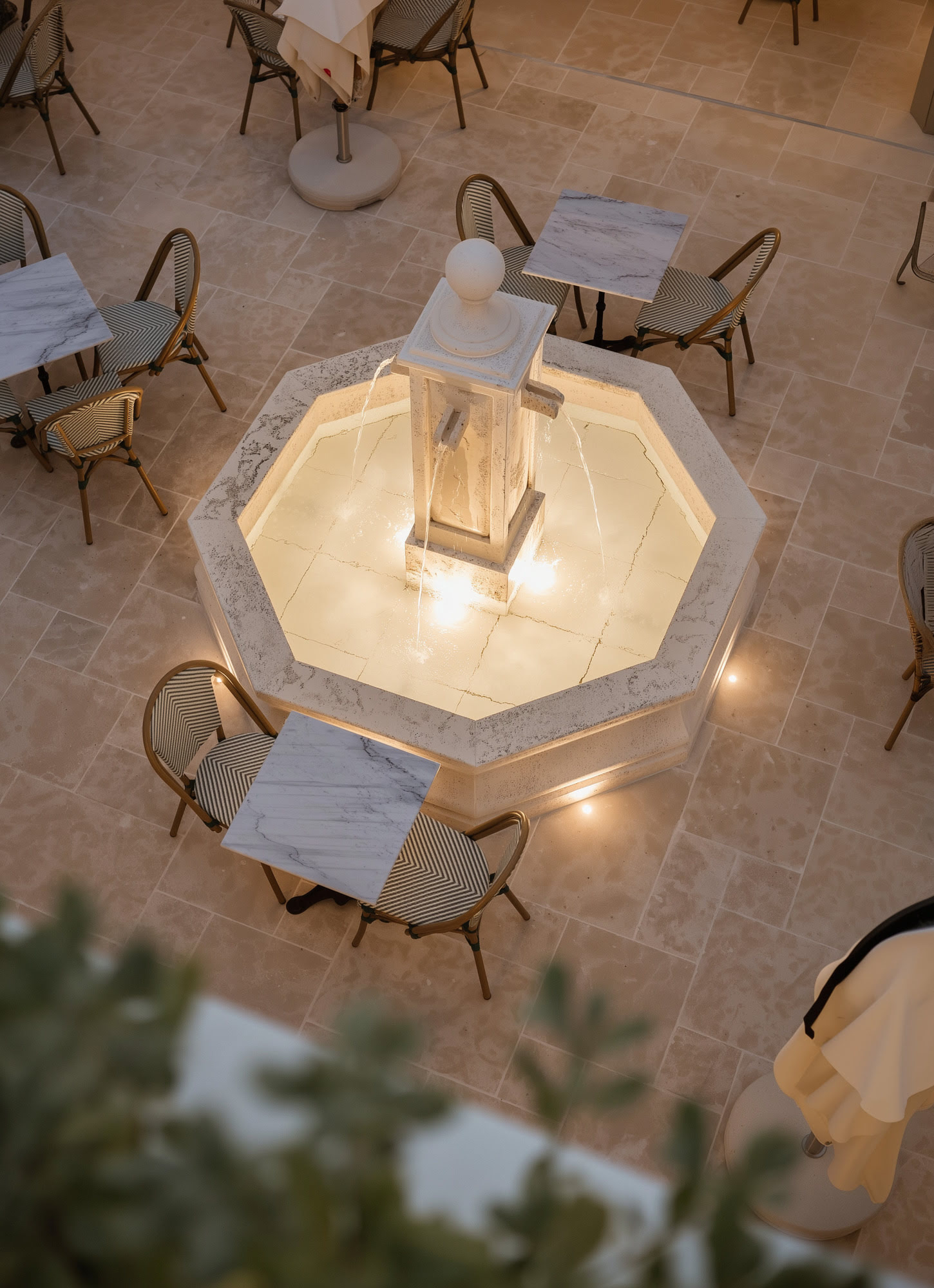 Fountain and plaza detail at FORUM expressing craftsmanship, atmosphere and the social heart of the development