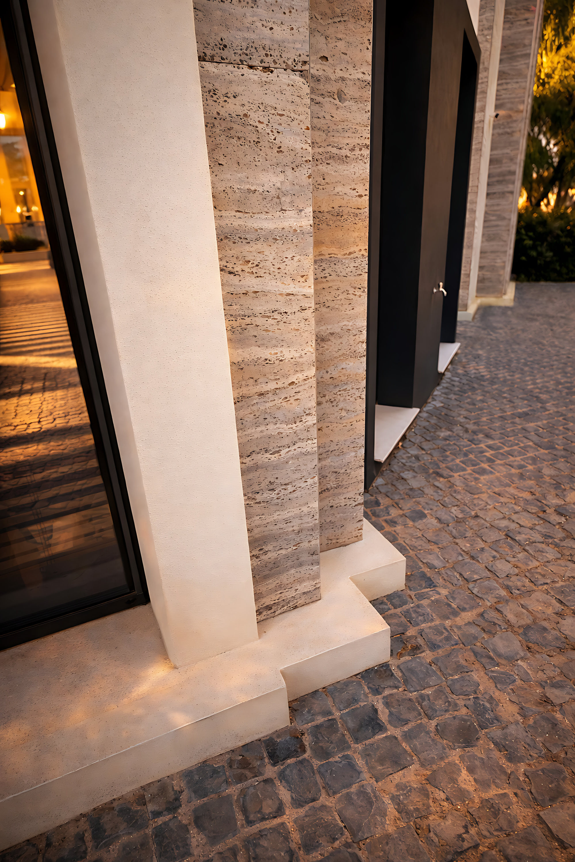 Close-up of stone columns and entrance thresholds at Hillview Estate emphasising depth, shadow and refined craftsmanship