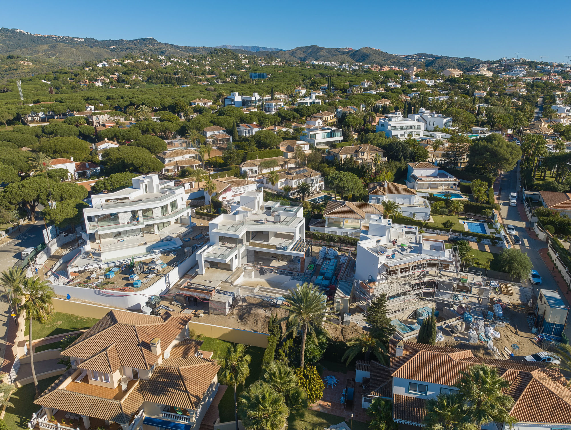 Aerial context view of M94 in Marbella East, showing the villa ensemble within the surrounding Mediterranean residential landscape