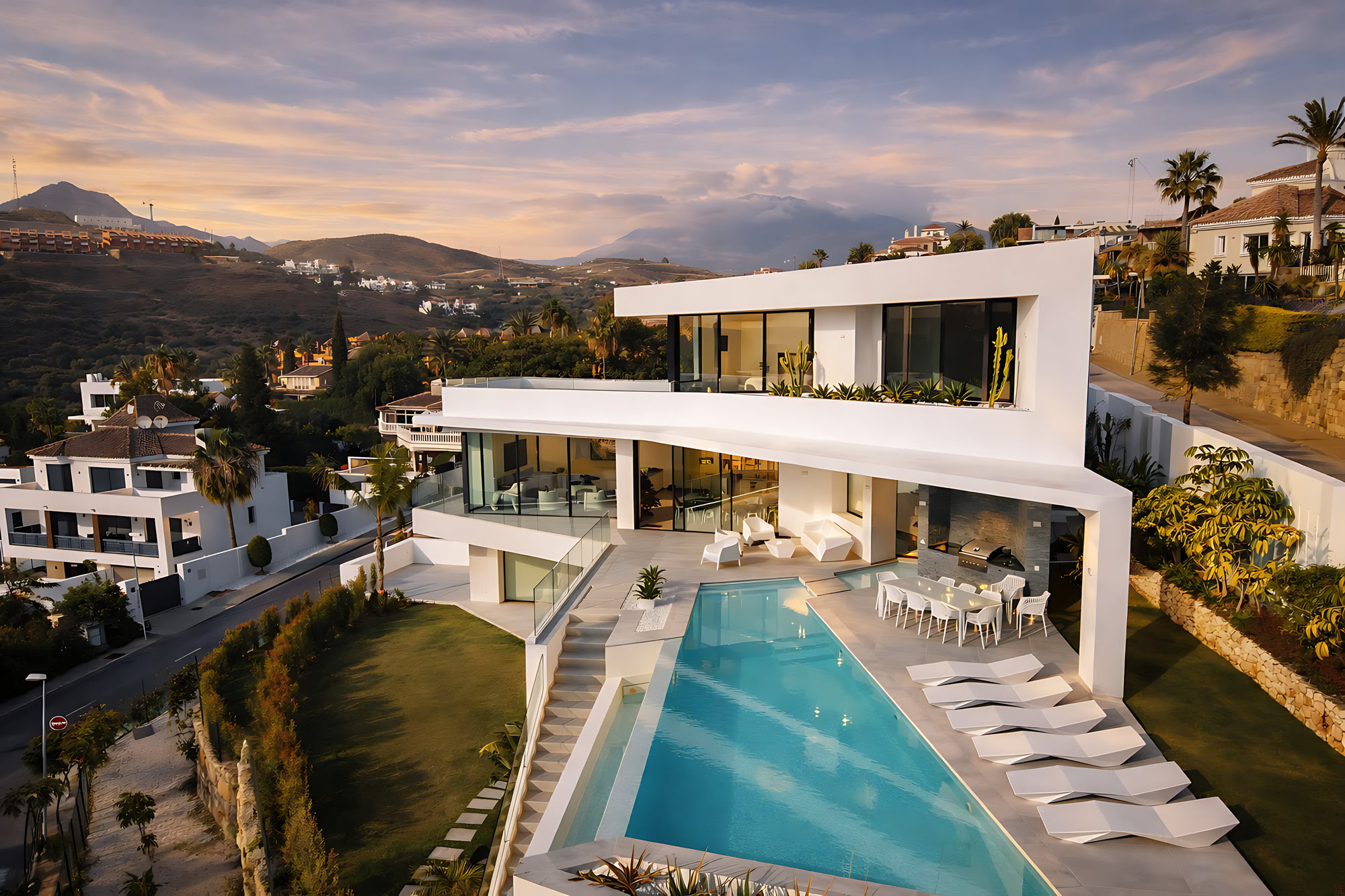 Aerial view of Villa Origami in La Zagaleta, Benahavís, showing the sculptural volume, terraces and elongated swimming pool