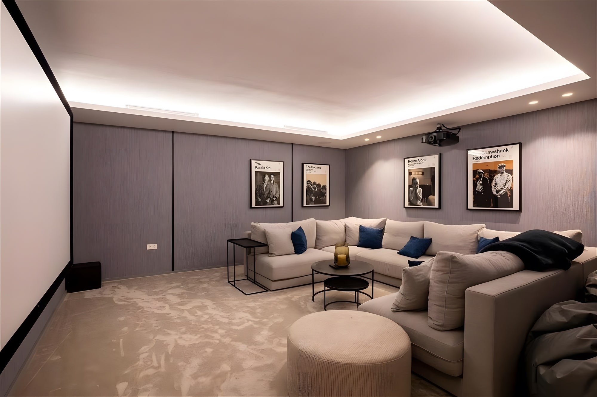Cinema and media room with acoustic wall treatment, concealed lighting and lounge seating