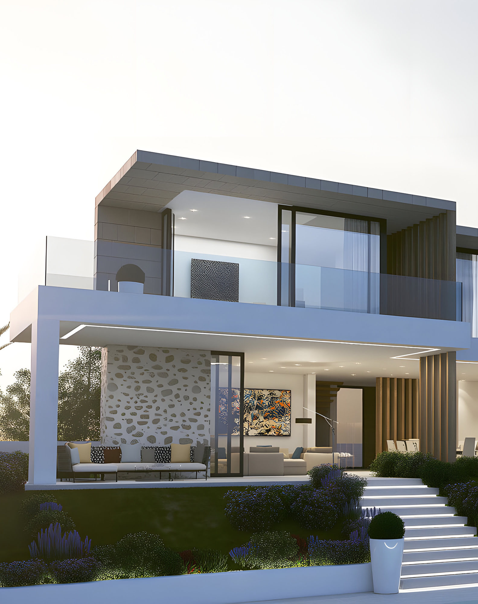 Main façade of UA211 at dusk in La Zagaleta, showing cantilevered terraces, stone cladding and a refined contemporary entrance composition